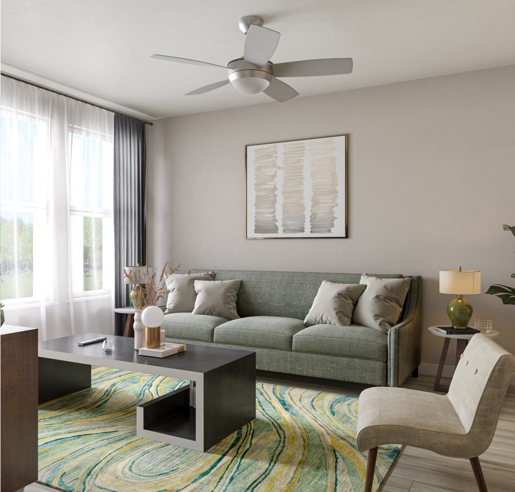 Living room with ceiling fan, large couch, coffee table, wood-style flooring and large windows
