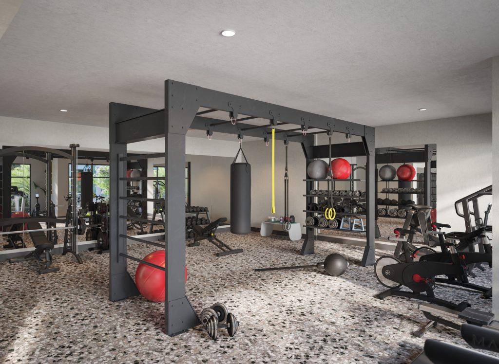 Fitness Center with Crossfit style machines, spin bikes, punching bag, and free weights